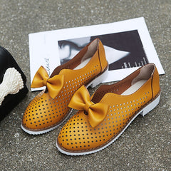 Hollow Out Bowknot Sneakers