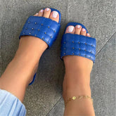 Nora Rivets Slip On Sandal