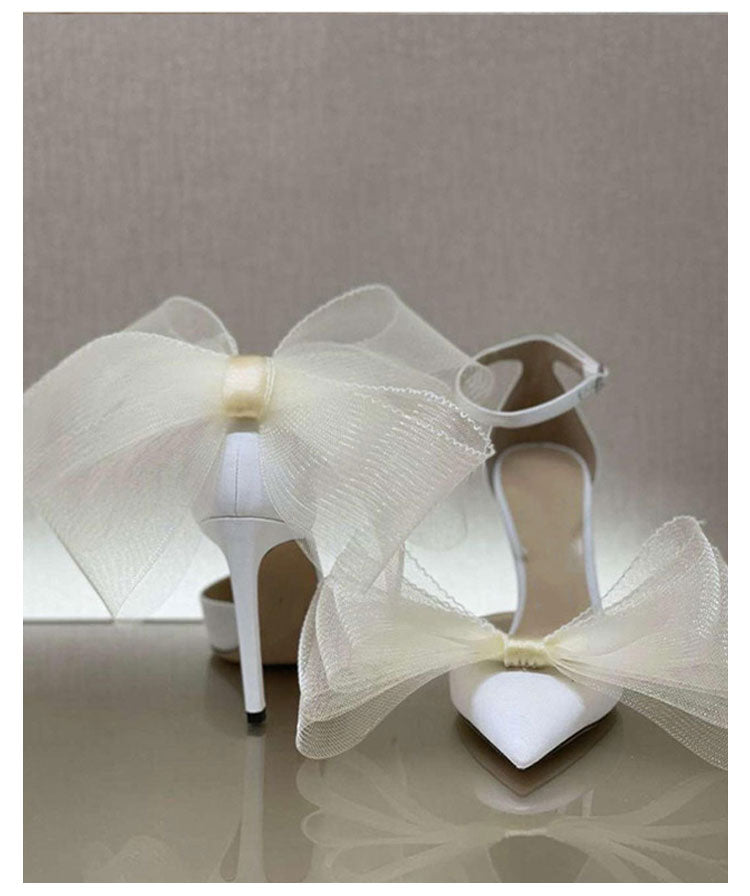 Heels with Asymmetrical Bows