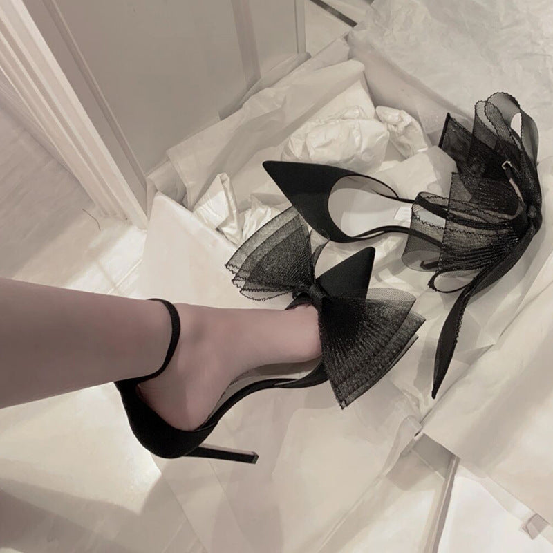 Heels with Asymmetrical Bows