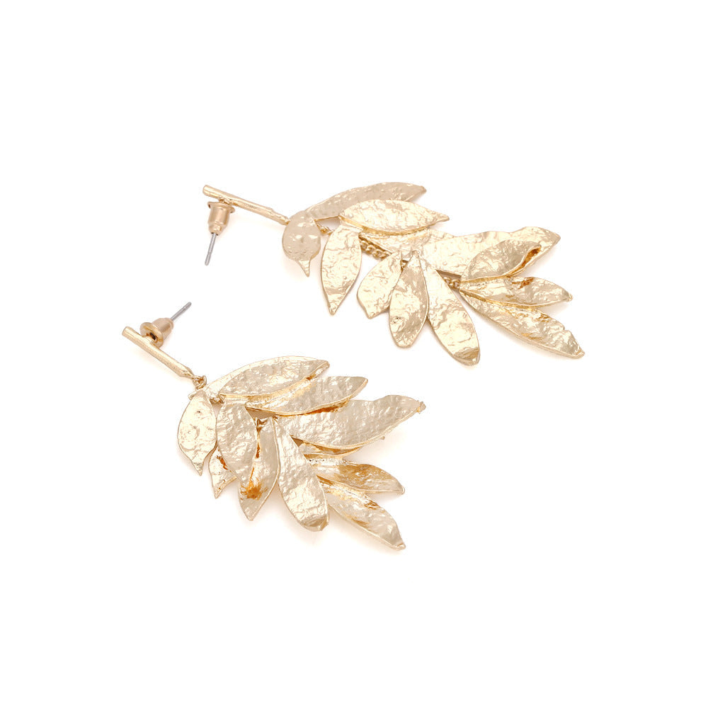 Flaxmaker Asymmetric Leaf Tassel Earrings