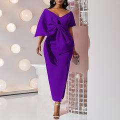 Dress With A Large Bow Slit