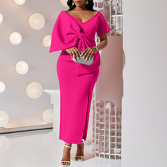 Dress With A Large Bow Slit