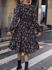 Black long-sleeved V-neck floral dress