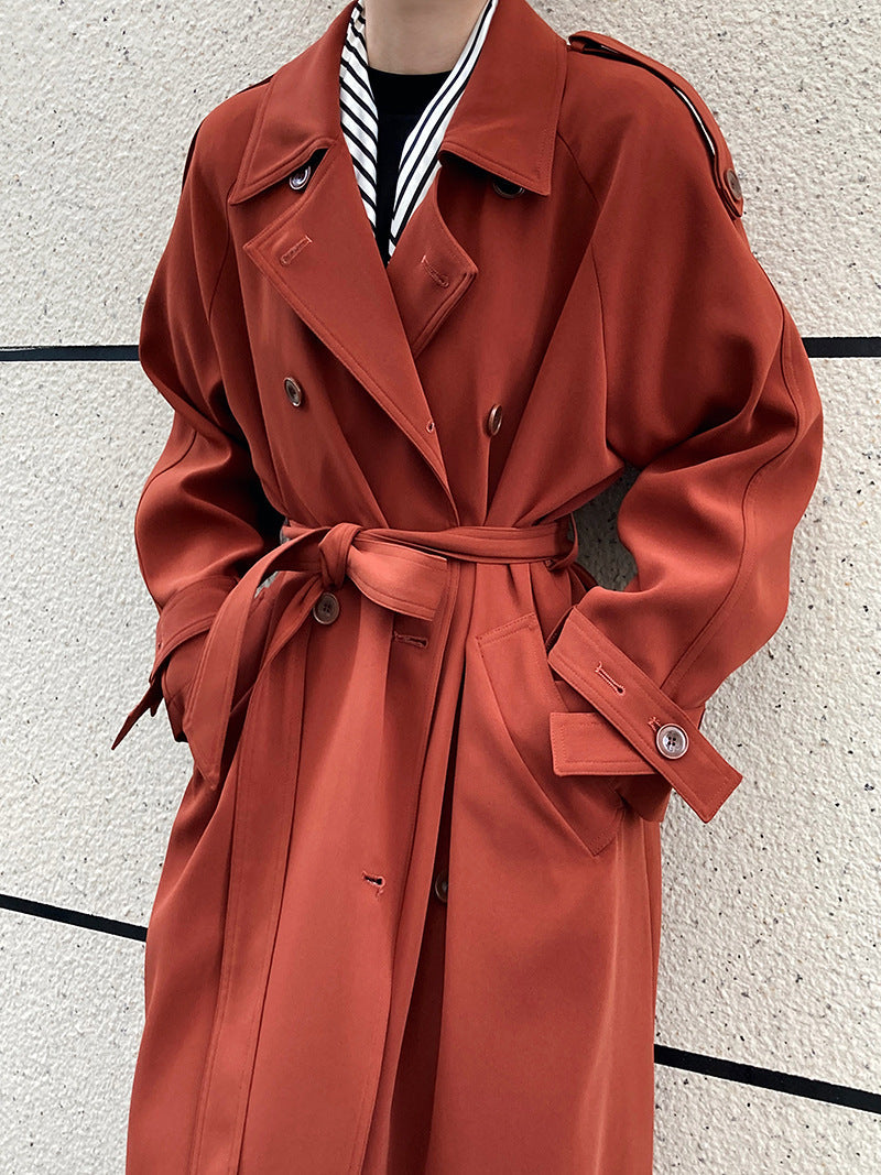 Drapey British style loose mid-length trench coat