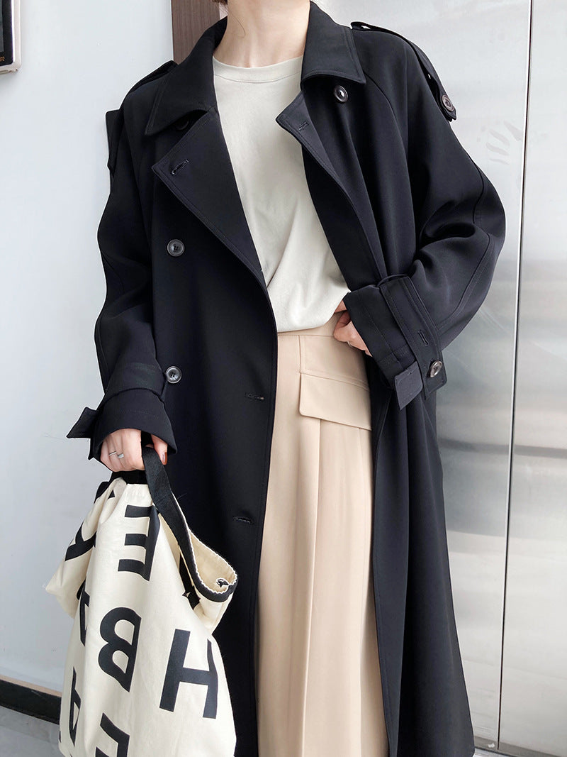 Drapey British style loose mid-length trench coat