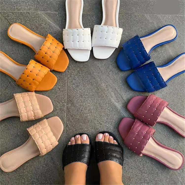 Nora Rivets Slip On Sandal